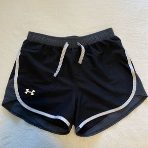 Black Under Armour shorts.